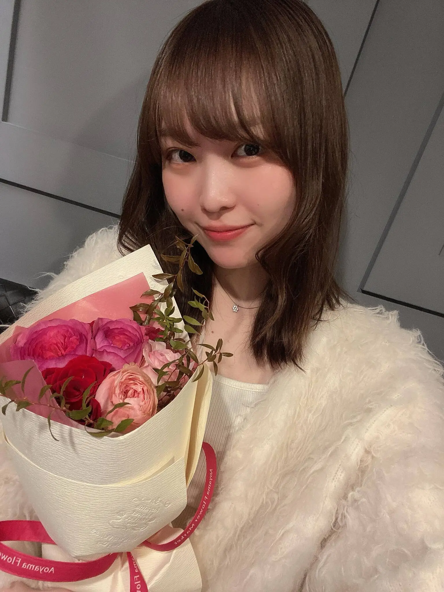 にこ